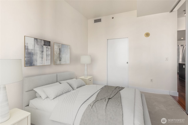 737 Olive Way Unit 2704, Seattle, WA 98101 - carpeted bedroom with baseboards
