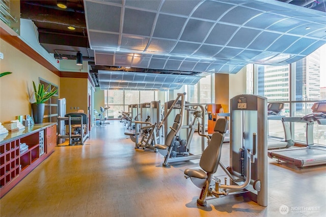 737 Olive Way Unit 2704, Seattle, WA 98101 - workout area with plenty of natural light and floor to ceiling windows