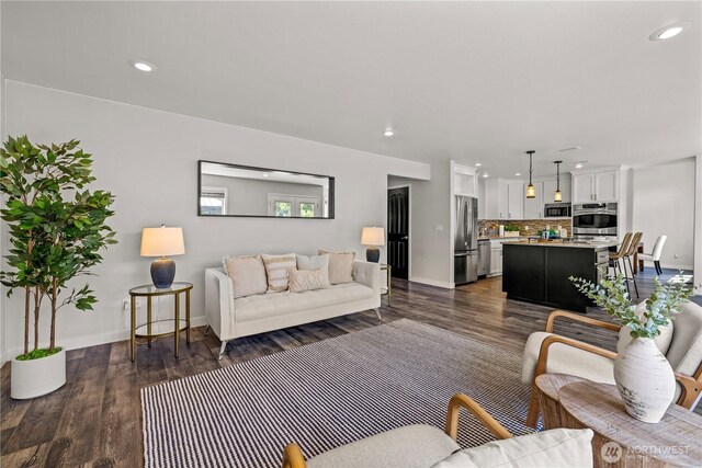 28314 164th Ave E, Graham, WA 98338 - living area featuring recessed lighting, dark wood finished floors, and baseboards