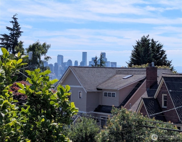 2650 W Newton St, Seattle, WA 98199 - back of house with roof with shingles