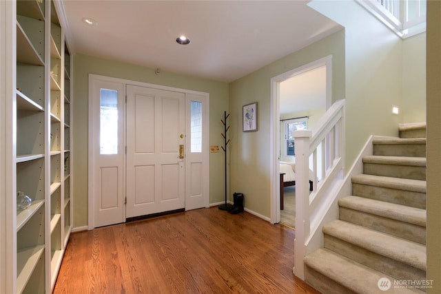 2650 W Newton St, Seattle, WA 98199 - foyer entrance with wood finished floors and stairs