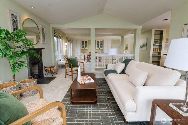 2650 W Newton St, Seattle, WA 98199 - carpeted living area featuring a fireplace, lofted ceiling, and recessed lighting