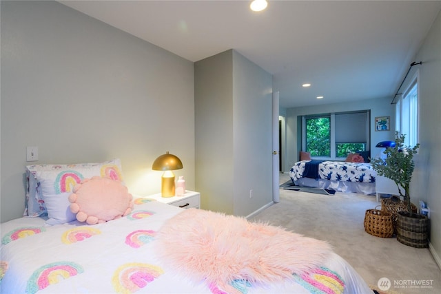 2650 W Newton St, Seattle, WA 98199 - carpeted bedroom with multiple windows and recessed lighting
