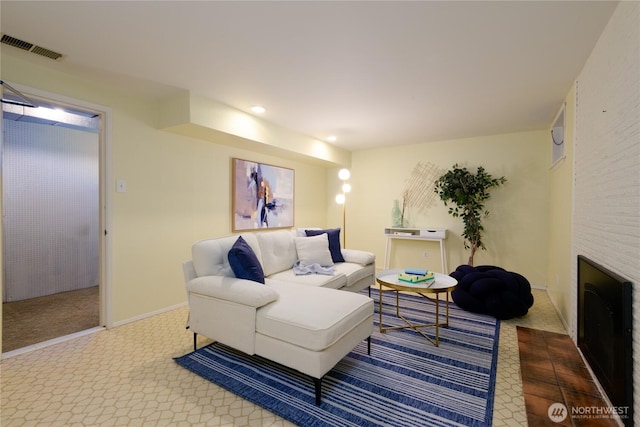 2650 W Newton St, Seattle, WA 98199 - living area featuring a large fireplace, carpet flooring, and recessed lighting