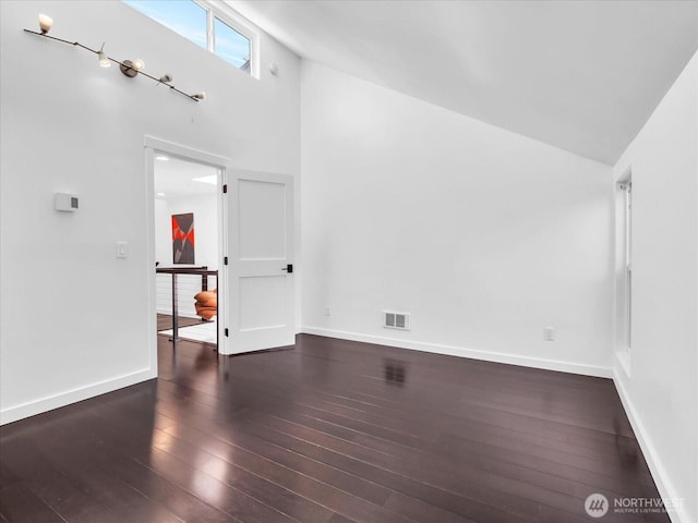 13893 NE 69th St Unit 689, Redmond, WA 98052 - unfurnished living room featuring wood-type flooring and high vaulted ceiling