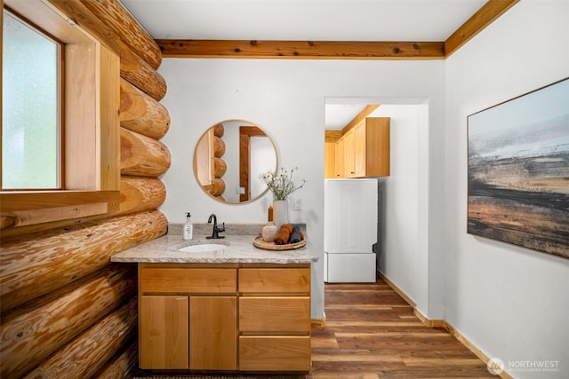 3105 Tamarack Pl, Wenatchee, WA 98801 - bathroom featuring vanity, wood finished floors, plenty of natural light, and baseboards