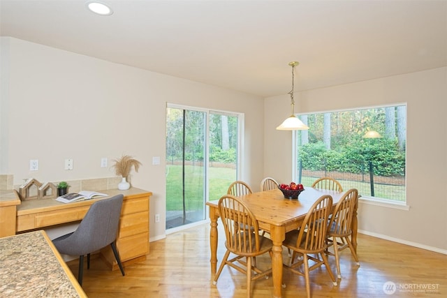 7321 Ashridge Ave SW, Port Orchard, WA 98367 - dining space featuring light wood-style floors, an office area, and recessed lighting