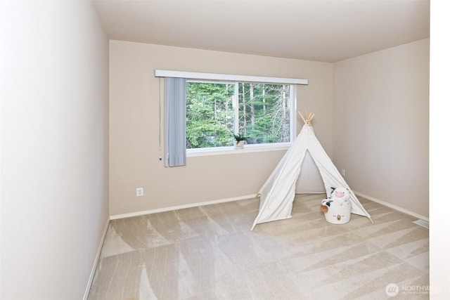 7321 Ashridge Ave SW, Port Orchard, WA 98367 - recreation room with baseboards and carpet floors