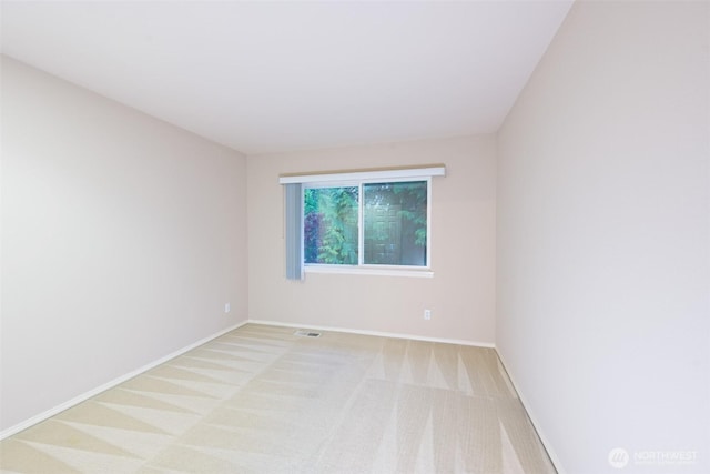 7321 Ashridge Ave SW, Port Orchard, WA 98367 - spare room with light colored carpet and baseboards