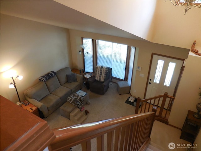 4558 SE Bakken Ct, Port Orchard, WA 98366 - living area with carpet floors, healthy amount of natural light, and a chandelier