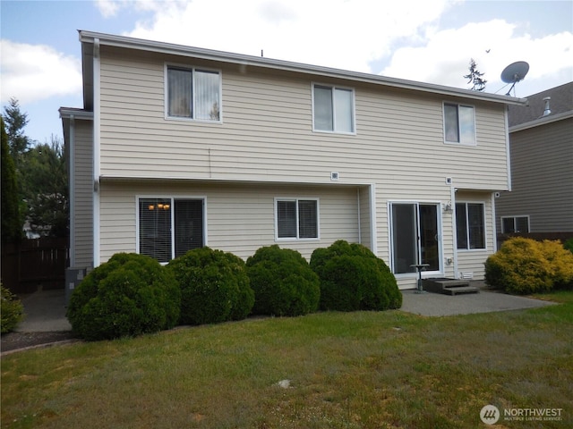 4558 SE Bakken Ct, Port Orchard, WA 98366 - rear view of house with entry steps, a yard, and a patio