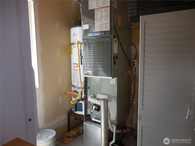 4558 SE Bakken Ct, Port Orchard, WA 98366 - utility room featuring gas water heater and heating unit