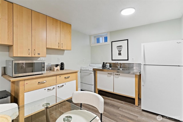 9520 2nd Ave NW, Seattle, WA 98117 - kitchen featuring white appliances, stainless steel counters, a sink, wood finished floors, and light brown cabinets