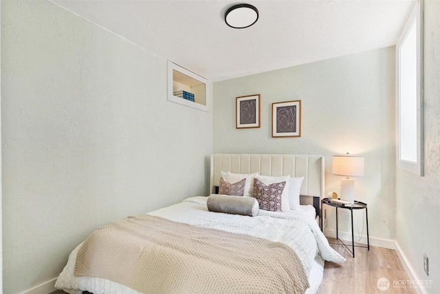 9520 2nd Ave NW, Seattle, WA 98117 - bedroom with wood finished floors and baseboards