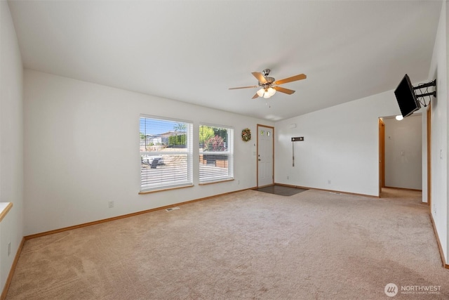 324 Mojave Ct, West Richland, WA 99353 - unfurnished room featuring ceiling fan, light colored carpet, baseboards, and lofted ceiling