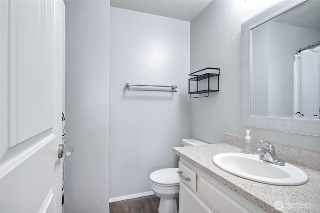 35432 18th Ave SW, Federal Way, WA 98023 - full bathroom featuring vanity, toilet, and wood finished floors
