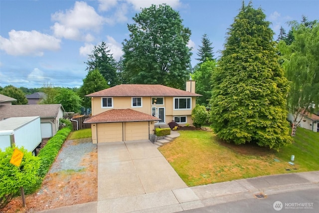 35432 18th Ave SW, Federal Way, WA 98023 - split foyer home with a front lawn, a chimney, and concrete driveway