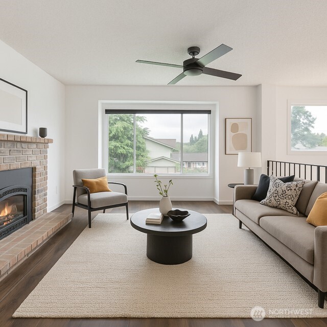 35432 18th Ave SW, Federal Way, WA 98023 - living room featuring dark wood finished floors, plenty of natural light, a fireplace, and a ceiling fan