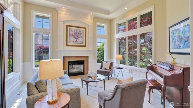 8504 146th Pl SE, Newcastle, WA 98059 - living area with a towering ceiling, a high end fireplace, a wainscoted wall, a decorative wall, and recessed lighting