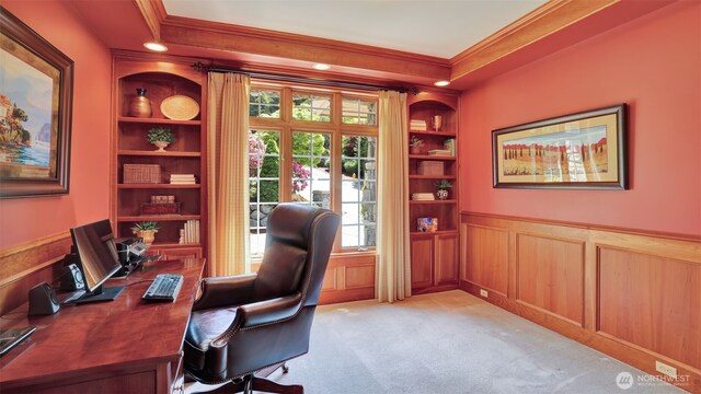 8504 146th Pl SE, Newcastle, WA 98059 - office space with crown molding, built in shelves, wainscoting, light carpet, and healthy amount of natural light