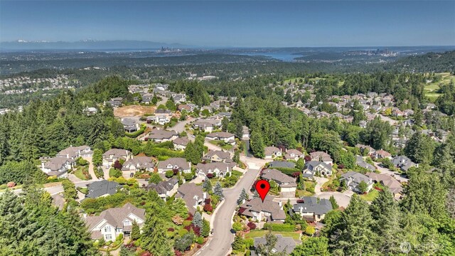 8504 146th Pl SE, Newcastle, WA 98059 - aerial view of property and surrounding area featuring nearby suburban area and a heavily wooded area