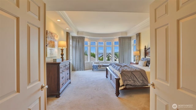 8504 146th Pl SE, Newcastle, WA 98059 - bedroom featuring light carpet, crown molding, and a tray ceiling