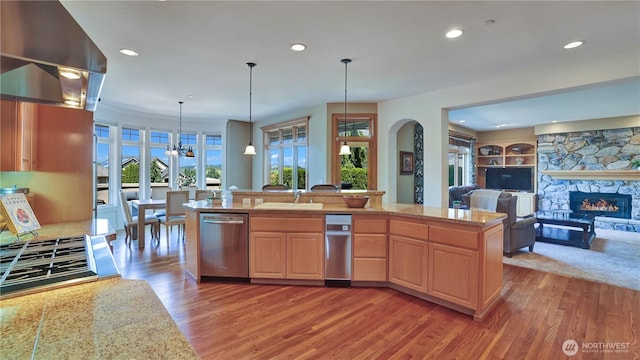 8504 146th Pl SE, Newcastle, WA 98059 - kitchen featuring stainless steel appliances, island exhaust hood, light brown cabinetry, light wood-style flooring, and recessed lighting
