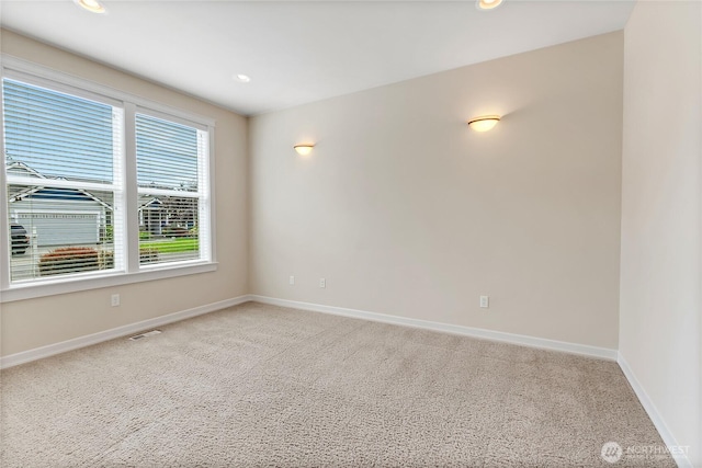 6103 153rd Ave E, Sumner, WA 98390 - spare room featuring light colored carpet and recessed lighting