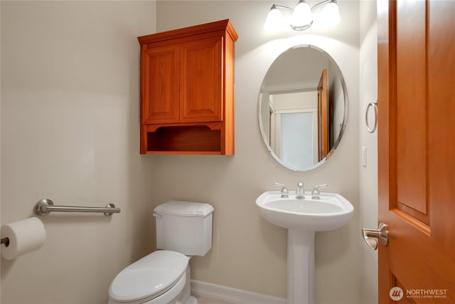 6103 153rd Ave E, Sumner, WA 98390 - half bathroom featuring toilet and a sink