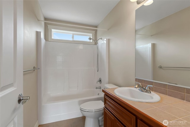 6103 153rd Ave E, Sumner, WA 98390 - full bath featuring vanity, bathing tub / shower combination, tile patterned flooring, and decorative backsplash