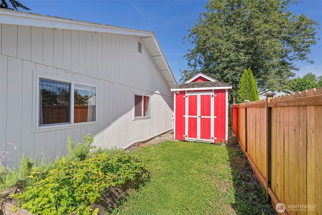 4434 Juli Ct SE, Olympia, WA 98501 - view of side of home with a storage shed and a fenced backyard