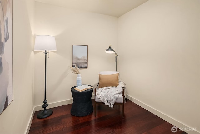 909 5th Ave Unit 303, Seattle, WA 98164 - living area featuring wood finished floors and baseboards