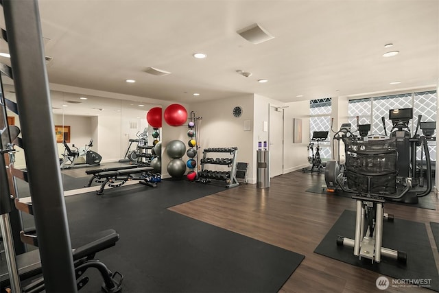 909 5th Ave Unit 303, Seattle, WA 98164 - exercise room with recessed lighting, baseboards, and wood finished floors