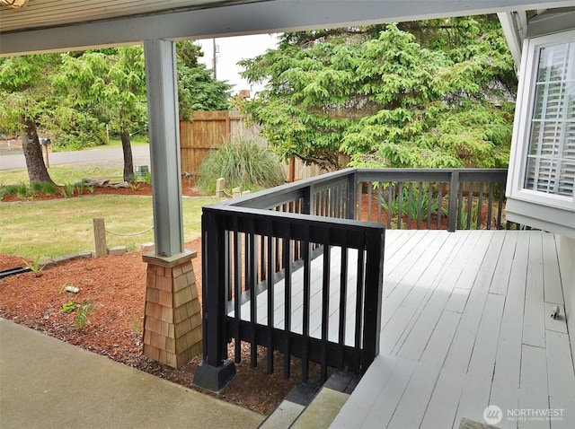 137 S Razor Clam Dr SW, Ocean Shores, WA 98569 - wooden deck featuring a lawn