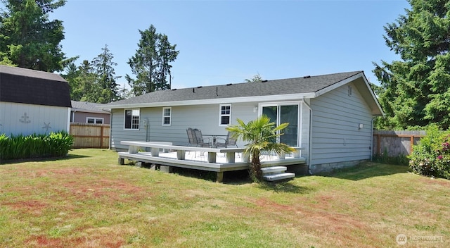 137 S Razor Clam Dr SW, Ocean Shores, WA 98569 - back of property featuring a wooden deck