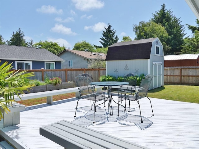 137 S Razor Clam Dr SW, Ocean Shores, WA 98569 - deck with a fenced backyard and outdoor dining area