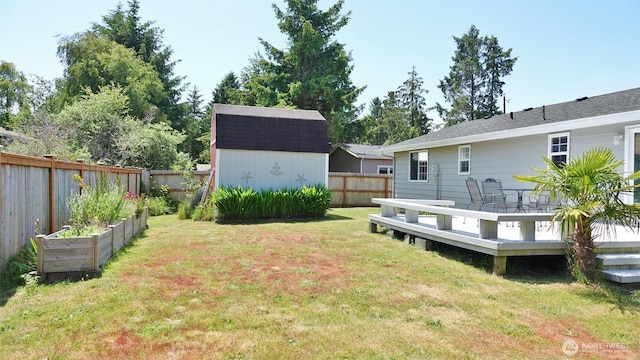 137 S Razor Clam Dr SW, Ocean Shores, WA 98569 - view of yard with a deck and a vegetable garden