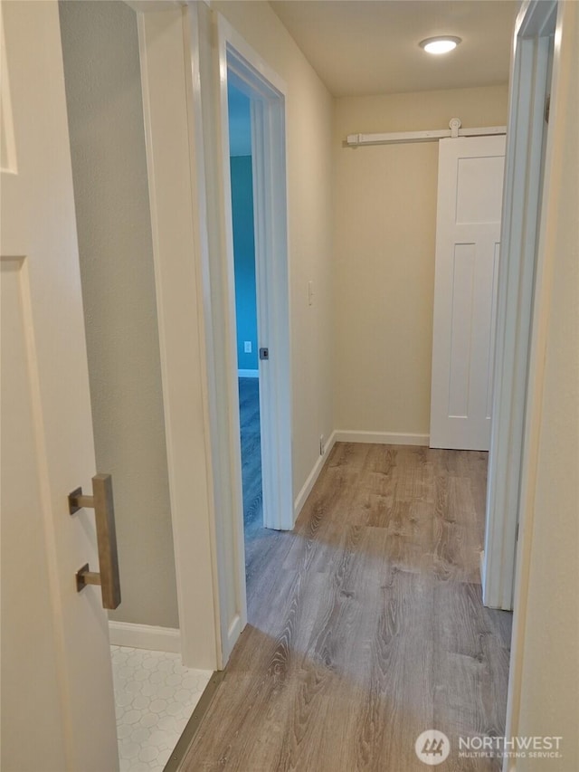 137 S Razor Clam Dr SW, Ocean Shores, WA 98569 - hallway featuring wood finished floors and baseboards