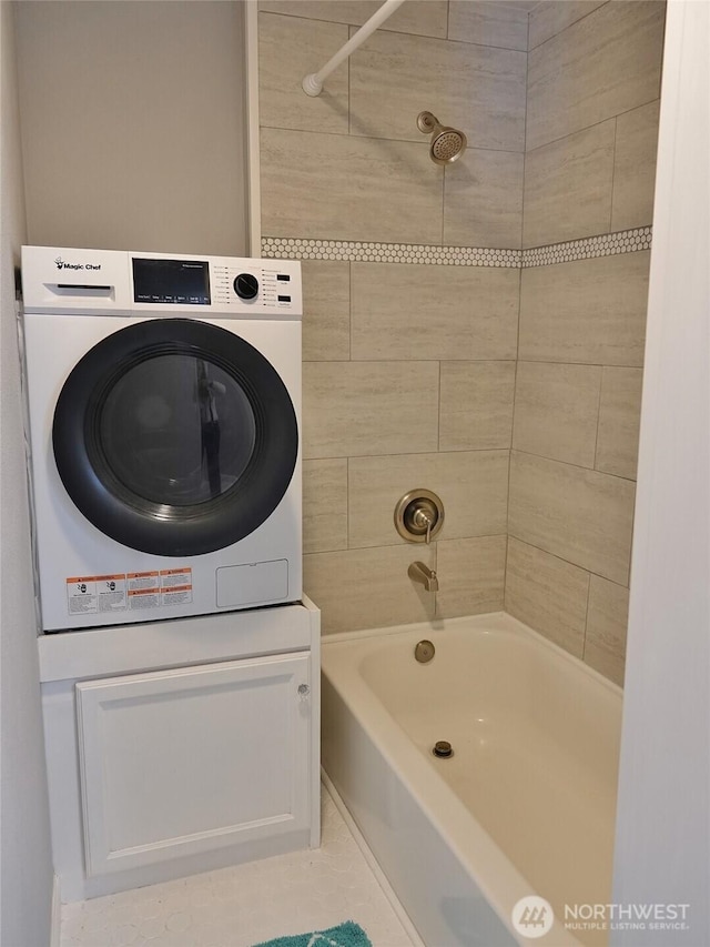 137 S Razor Clam Dr SW, Ocean Shores, WA 98569 - bathroom featuring washer / dryer and shower / tub combination