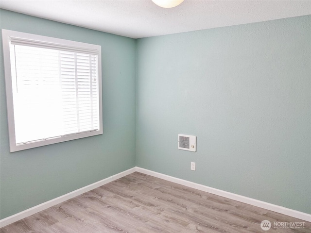 137 S Razor Clam Dr SW, Ocean Shores, WA 98569 - spare room with wood finished floors and baseboards