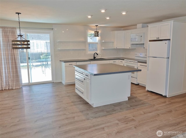 137 S Razor Clam Dr SW, Ocean Shores, WA 98569 - kitchen featuring white appliances, open shelves, a sink, plenty of natural light, and recessed lighting