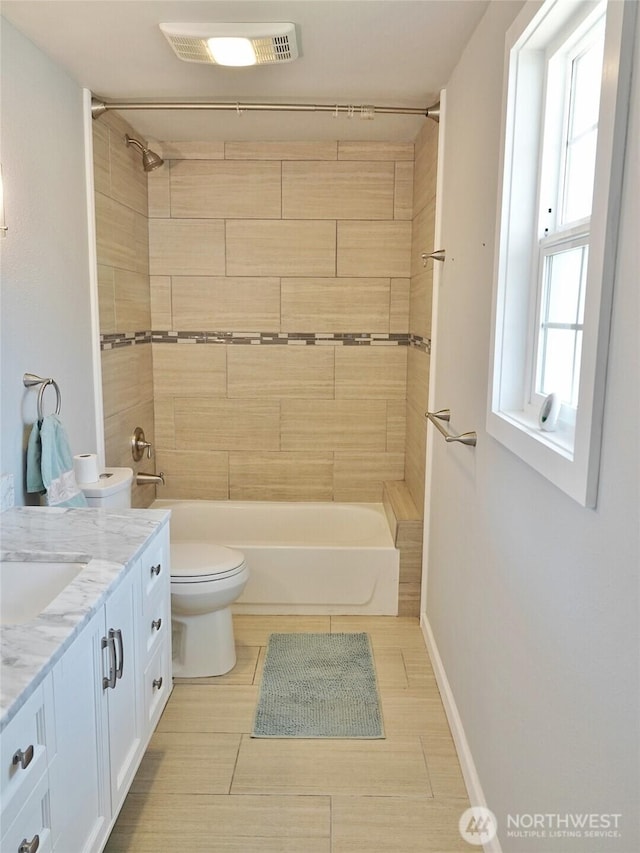 137 S Razor Clam Dr SW, Ocean Shores, WA 98569 - full bathroom featuring vanity, toilet, tub / shower combination, and baseboards