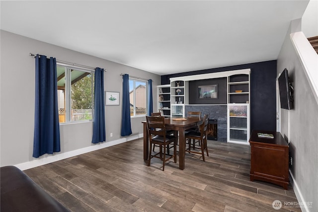 6858 Flute St SE, Lacey, WA 98513 - dining room with dark wood-style flooring and baseboards