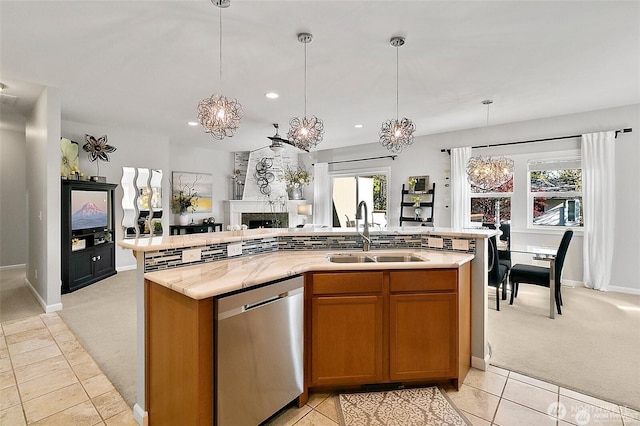 226 Alnus Way, Bremerton, WA 98310 - kitchen featuring dishwasher, light carpet, a chandelier, open floor plan, and a kitchen island with sink