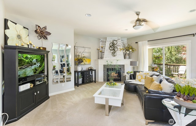 226 Alnus Way, Bremerton, WA 98310 - living room with a warm lit fireplace, light carpet, and recessed lighting