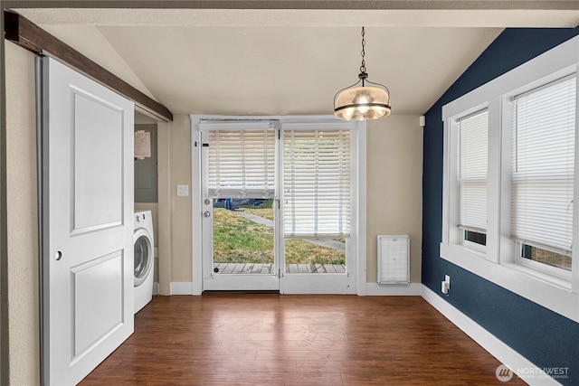 4050 E G St, Tacoma, WA 98404 - laundry room featuring washer / dryer, dark wood-style floors, healthy amount of natural light, and a chandelier