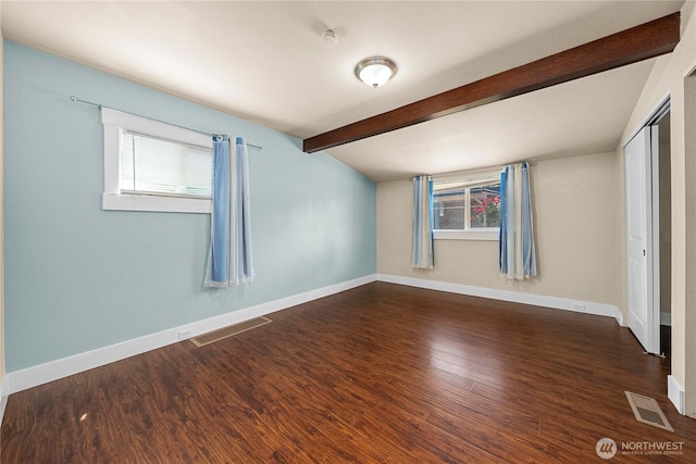 4050 E G St, Tacoma, WA 98404 - spare room featuring plenty of natural light and wood finished floors