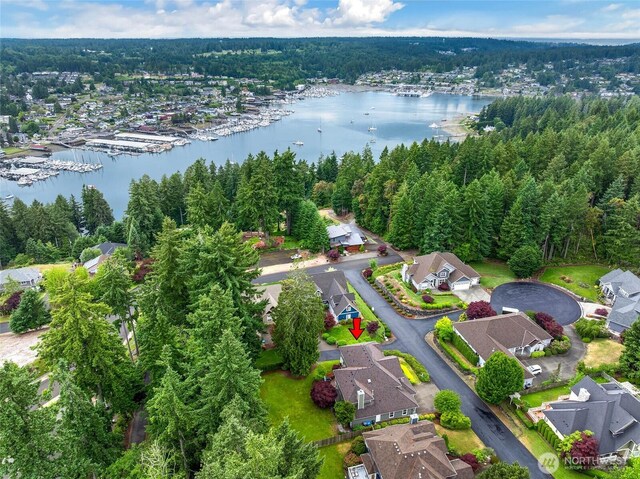 2418 83rd St NW, Gig Harbor, WA 98332 - aerial perspective of suburban area with a nearby body of water