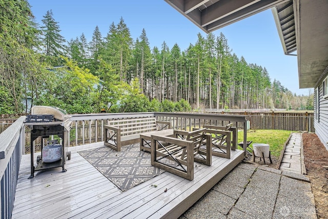 18622 SE 268th St, Covington, WA 98042 - wooden deck featuring a view of trees and an outdoor living space