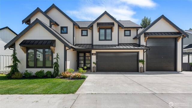 2140 Lagerwey Cir, Lynden, WA 98264 - modern inspired farmhouse with a standing seam roof, driveway, a metal roof, a front yard, and a garage